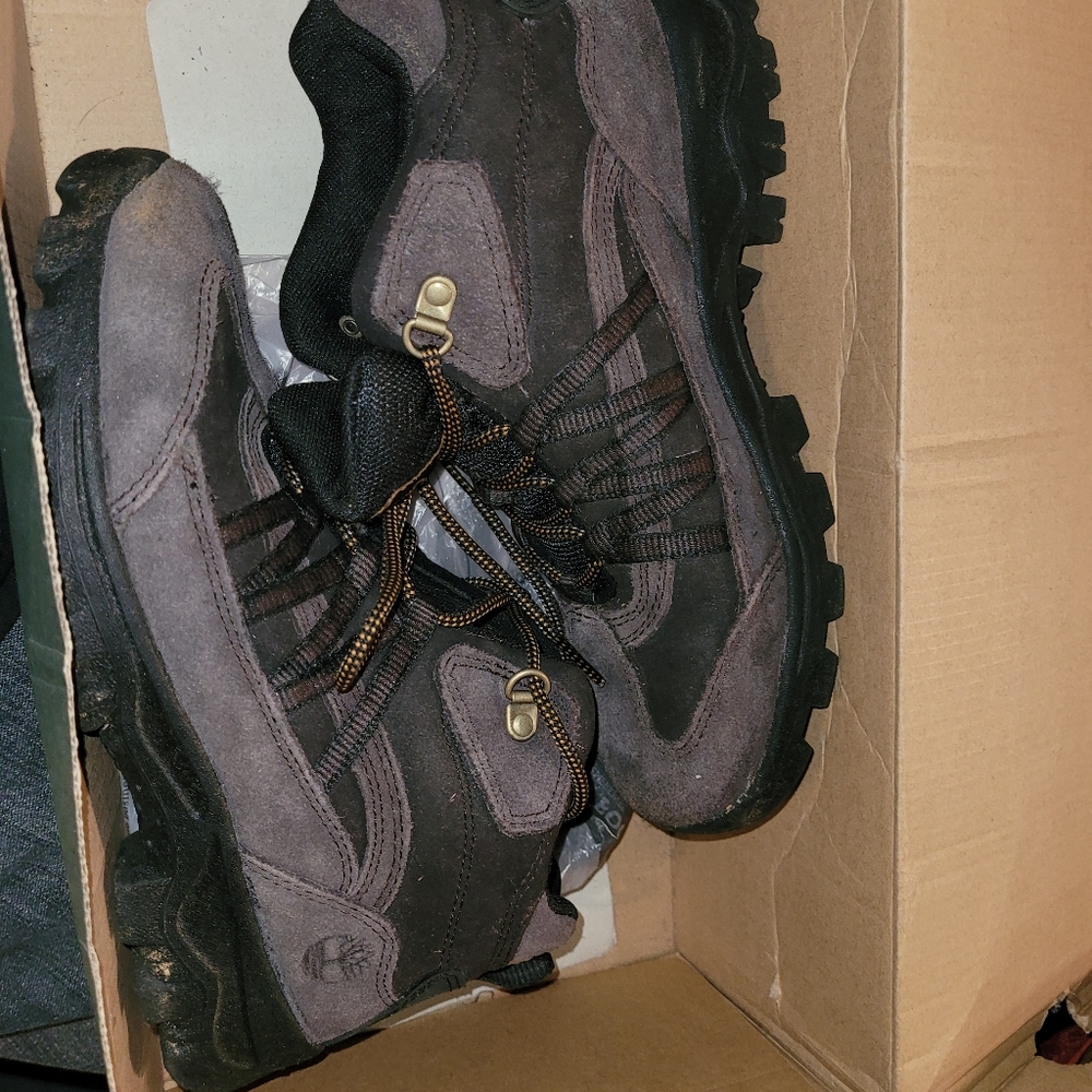 Pair of timberland mt.maddsen mid boot dark brown